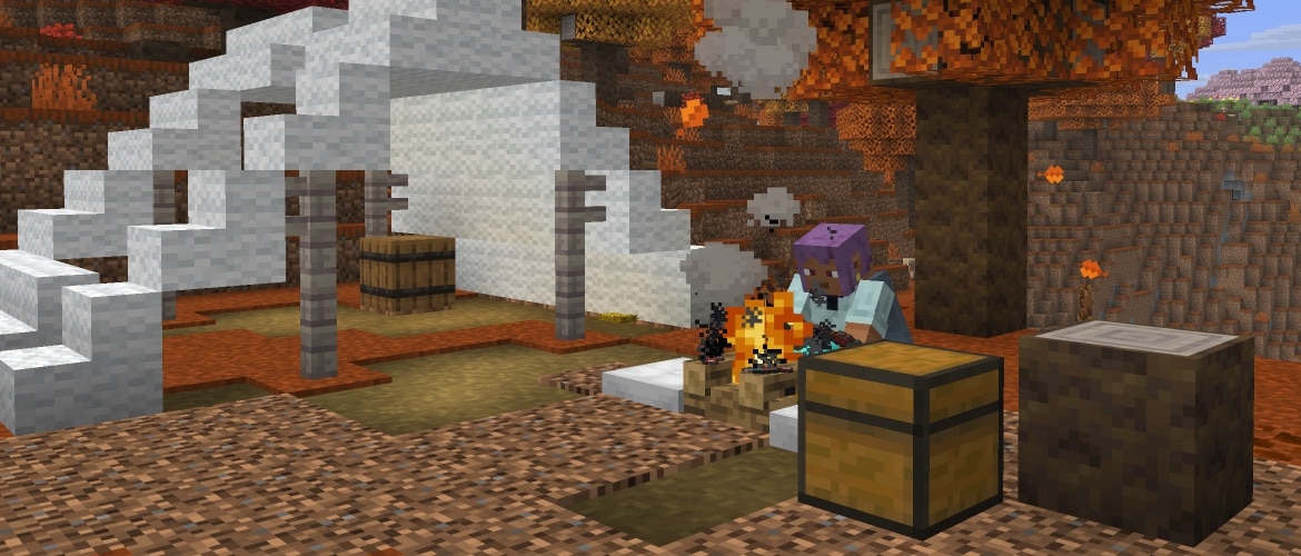 A Minecraft character sitting beside a campfire and a white tent in an autumn-colored dappled forest.